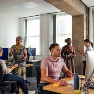 Colleagues Engaged in Office Tasks
