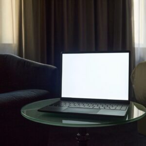 Laptop Displaying Blank Screen for Product Mockup in Home Office