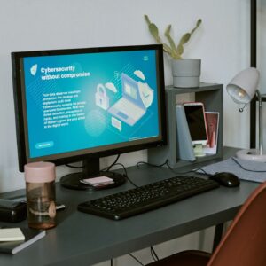 Office Computer Displaying Cybersecurity Service Landing Page